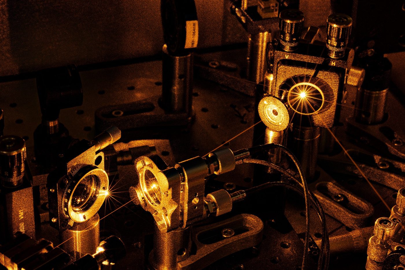 Frequency-converted visible laser on an optical bench